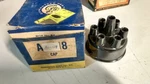 Genuine Parts - Al-128 Distributor Cap. Fixed Price $12.00.
