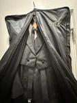 Arthur Ashmore Black Stripped Tail Suit With Bag. Size L, 31-32 Waist, 6' Height. Fixed Price $150.00.